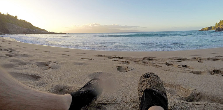 Photo of Steven's feet on beach