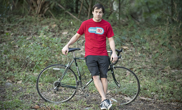Photo of Steven with his bike