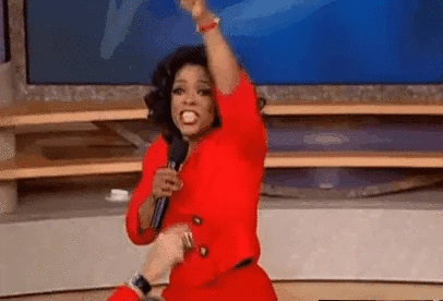 Gif of Oprah giving gifts