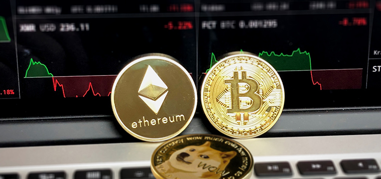 Photo of cryptocurrencies Ethereum, Bitcoin, and Dogecoin