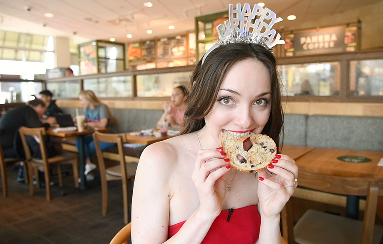Photo of Lauren with a birthday freebie